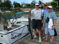 clients with their wahoo at GYC dock