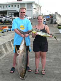 Colin & partner with yellowfin tuna and dorado at fishmarket dock