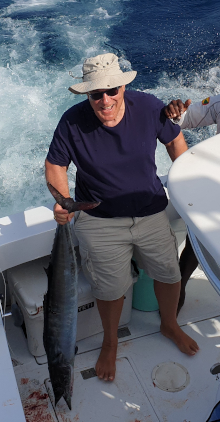 Howard with the wahoo he caught in the boat