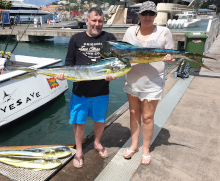2 anglers with catch of 4 dorado at the dock0209ddo